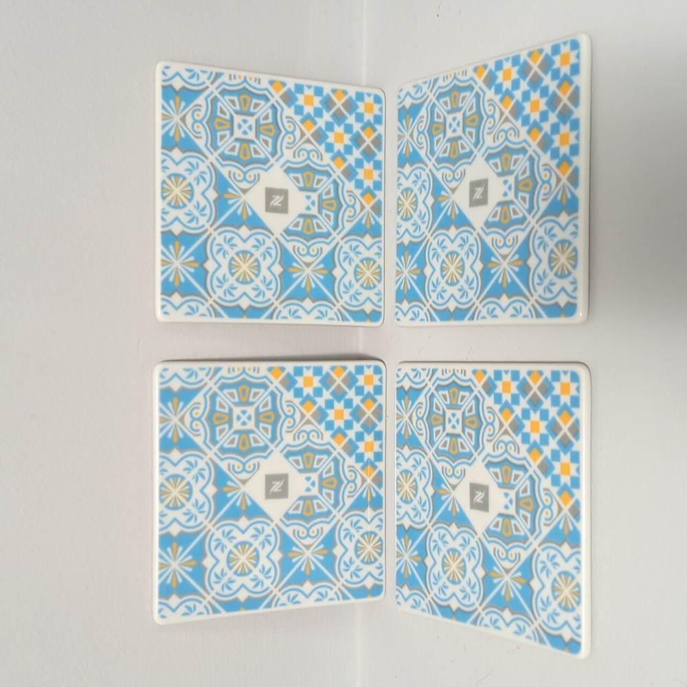 NEW NESPRESSO VERY RARE SET OF 4 MIAMI PORCELAIN COASTERS MADE IN PORTUGAL